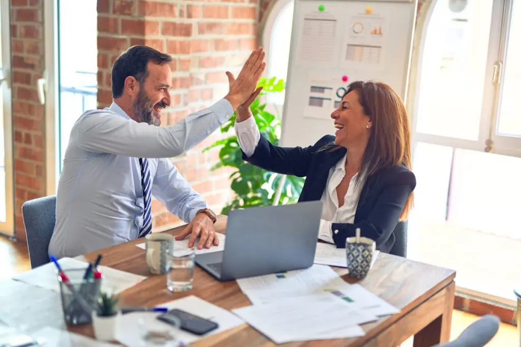 Happy employees with voluntary benefits coverage in Washington state